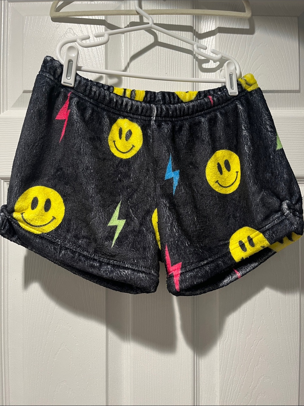 NWOT Girls' Black Plush Smiley Face Pajama Shorts with Neon Lightning